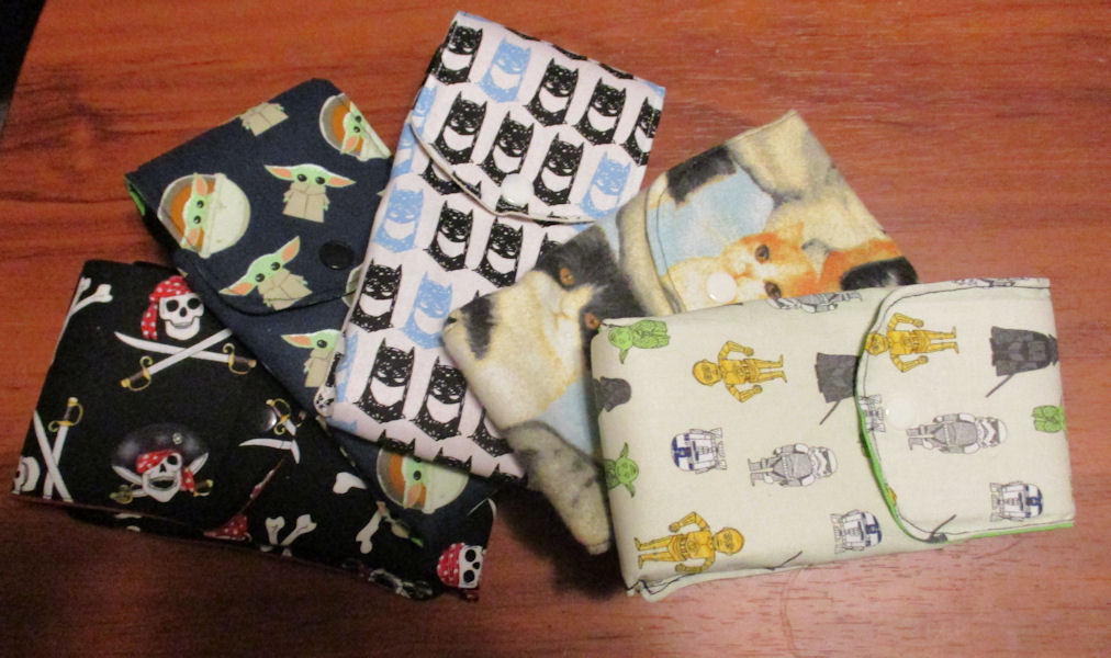 Several Phone Pouches in Various Prints